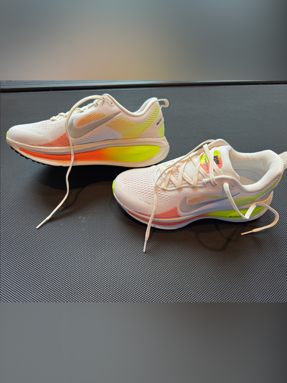 Nike Vomero 18 Women’s White Running Shoes with Neon Orange and Neon Yellow